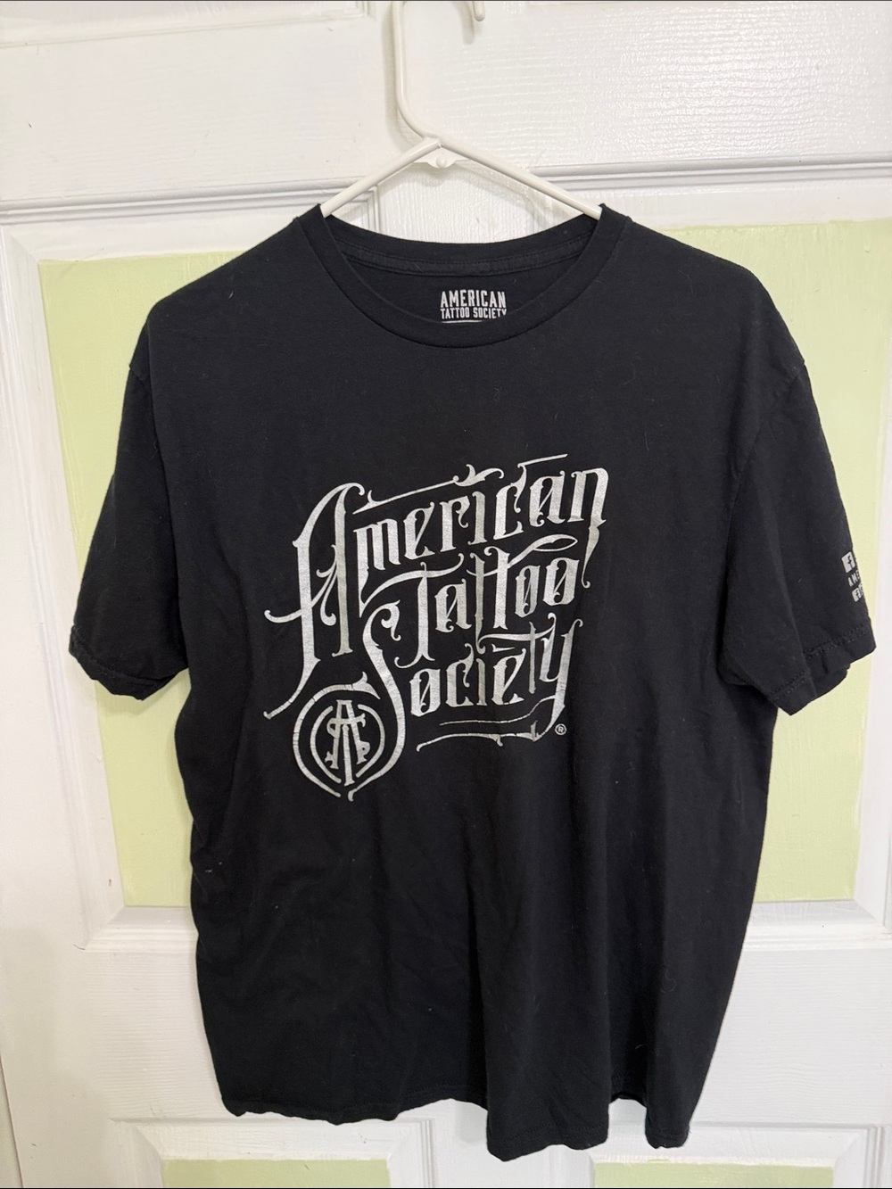 (0000) American Tattoo Society Black Graphic Short Sleeve Tee, Size: Large